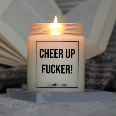 Light it up: The quote candle "Cheer Up Fucker" creates cozy vibes, intense fragrance and deep meaning – all in one flame.