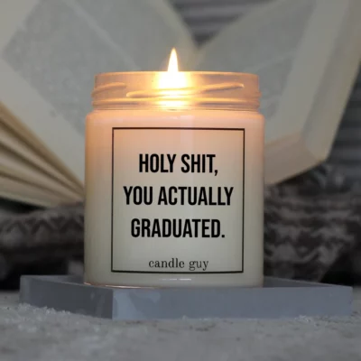 Light it up: The quote candle "Holy Shit, you actually graduated." creates cozy vibes, intense fragrance and deep meaning – all in one flame.