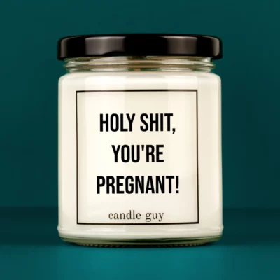 Discover our bestselling quote candle: "Holy Shit, you're pregnant!" – handcrafted with love and 100% soy wax. A true original by candle guy.