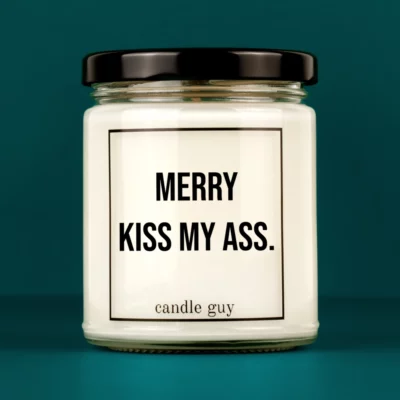 Discover our bestselling quote candle: "Merry kiss my ass." – handcrafted with love and 100% soy wax. A true original by candle guy.