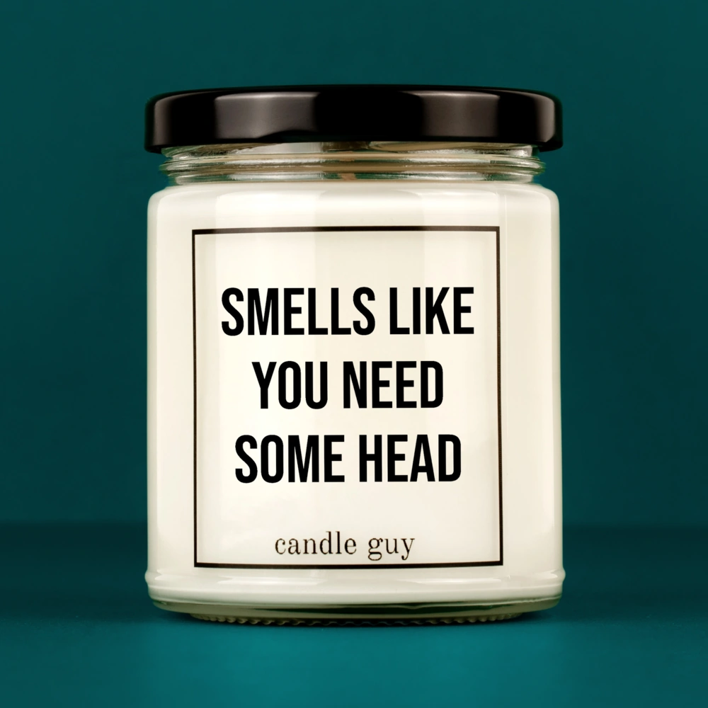 Discover our bestselling quote candle: "Smells like you need some head" – handcrafted with love and 100% soy wax. A true original by candle guy.