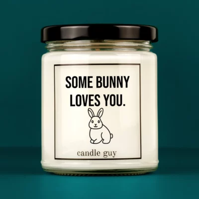 Discover our bestselling quote candle: "Some bunny loves you." – handcrafted with love and 100% soy wax. A true original by candle guy.