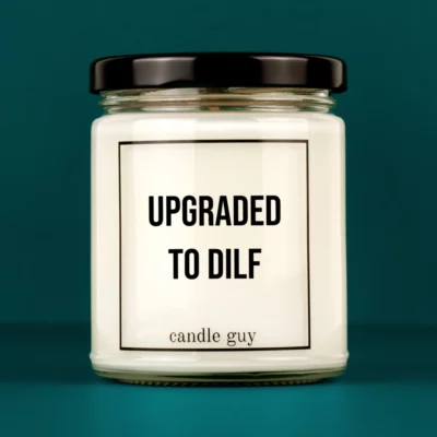 Discover our bestselling quote candle: "Upgraded to DILF" – handcrafted with love and 100% soy wax. A true original by candle guy.